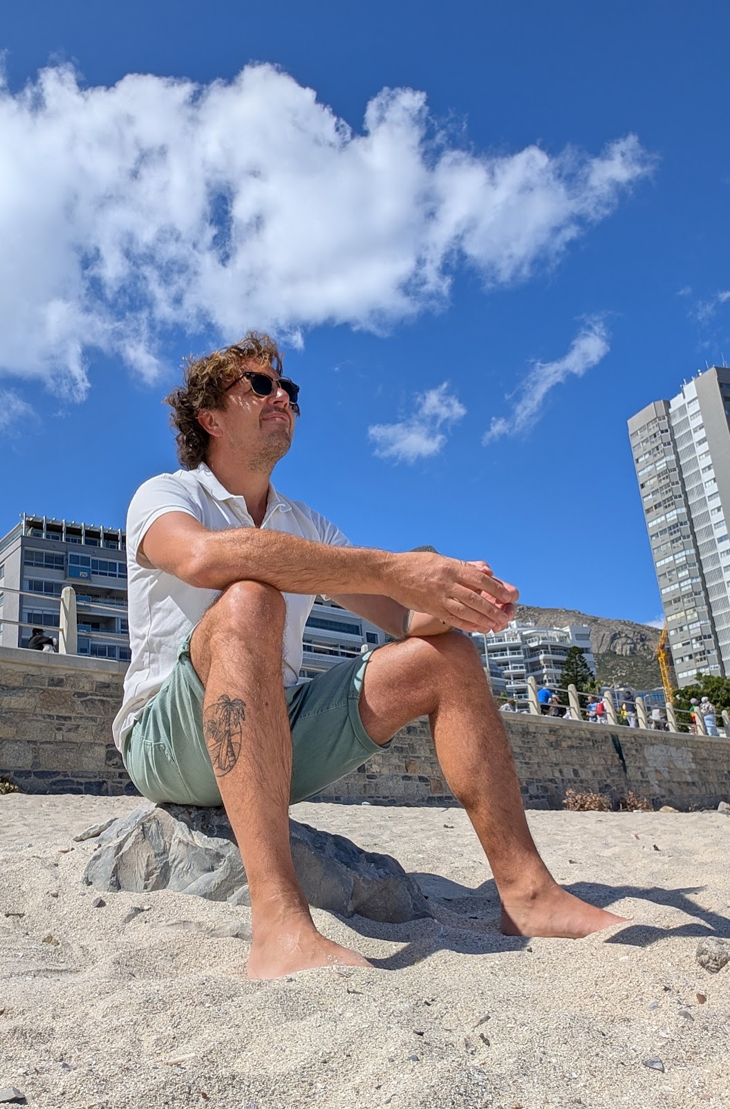 Ken thinking on the beach